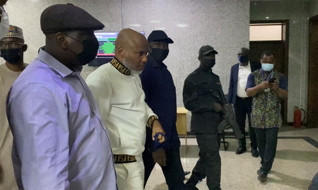 Men of the Nigeria State Secret Police (SSS) escorts Indigenous People of Biafra (IPOB), Nnamdi Kanu (2nd L), outside the Federal High Court during the trial of the IPOB leader.