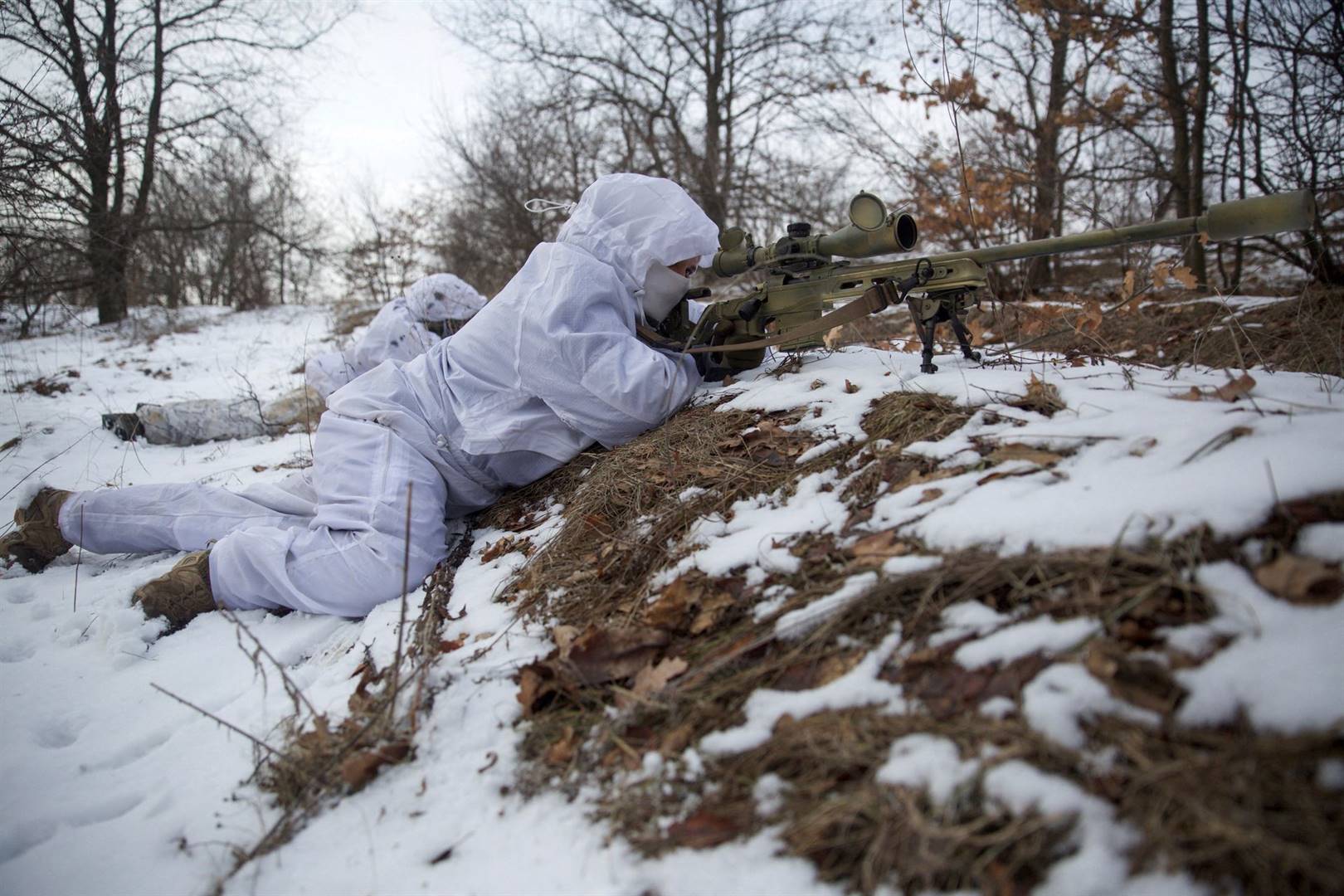 Skerpskutters neem op 17 Januarie deel aan ’n militêre oefening van die Oekraïense gewapende magte in die Donetsk-streek in die land.  Foto: Reuters/Anna Kudriavtseva
