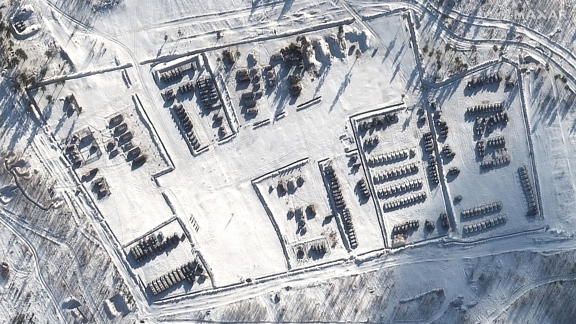 View of tanks, artillery, and tents at the Pogonovo training area, about 100 miles from the Ukrainian border, on Jan. 19, 2022. Satellite image ©2022 Maxar Technologies