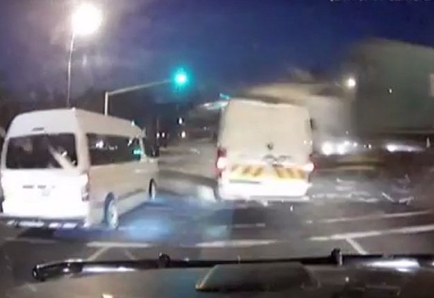<b>SPLIT-SECONDS TO LIVE:</b> Two taxis in front of the camera move forward the truck smashes through crossing vehicles at high speed. A car that was on their right has already been vaporised. Watch the video. <i>Image: YouTube</i>