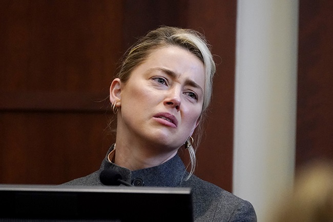 US actor Amber Heard testifies in the courtroom at the Fairfax County.