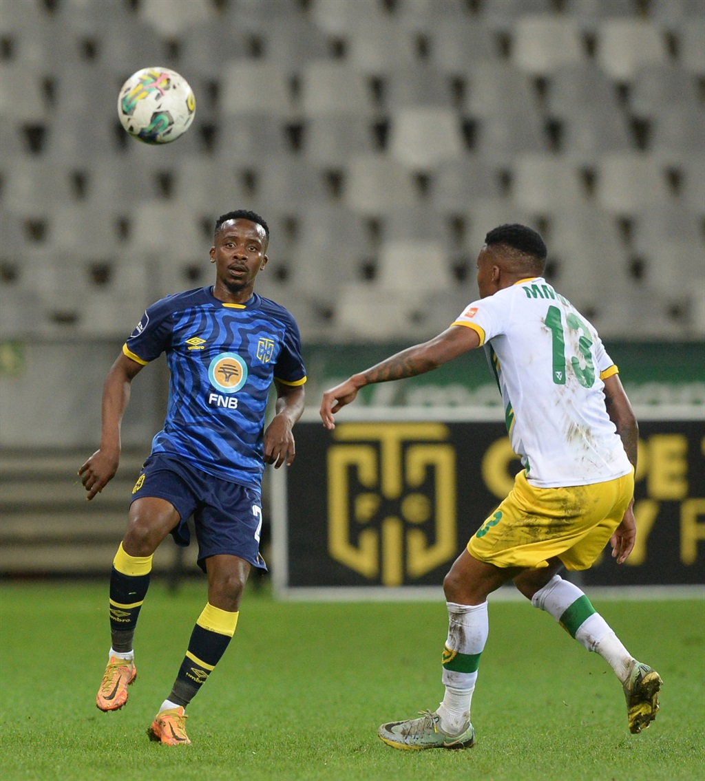 Thabo Nodada of Cape Town City is challenged by Pule Mmodi of Golden Arrows during the DStv Premiership 2022/23 game between Cape Town City and Golden Arrows at Cape Town Stadium on 3 May 2023 