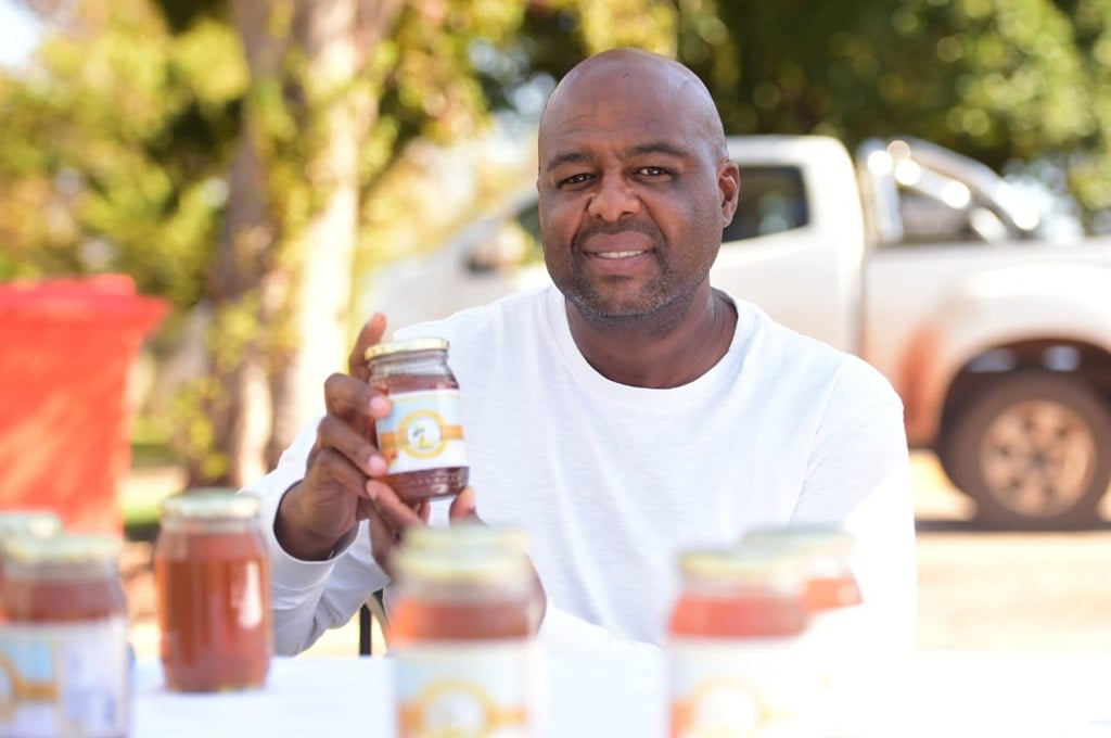 Bee farmer, Roman Tladi of Rokotla Honey in Makapanstad showcased his honey products during a World Bee Day commemoration. Photos by Raymond Morare
