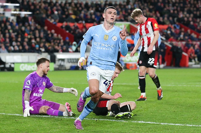 Manchester City's Phil Foden celebrates after scoring a hat-trick during the Premier League match against Brentford at Brentford Community Stadium on 5 February 2024. (Photo by James Gill - Danehouse/Getty Images)