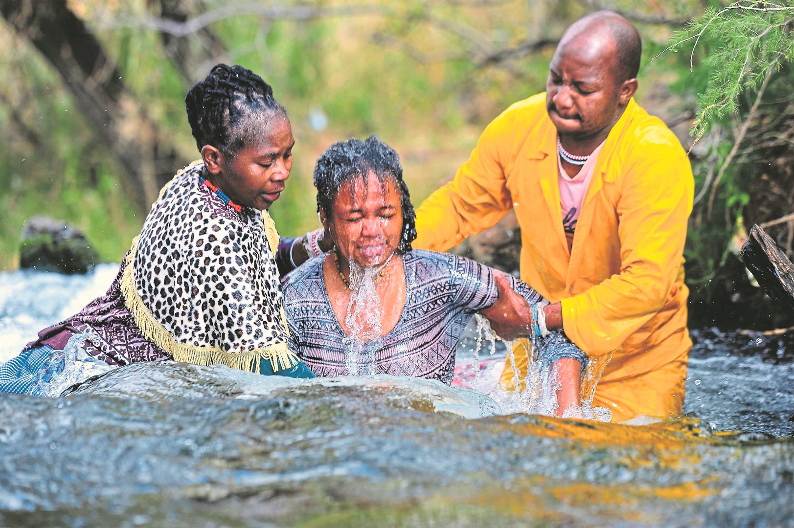 The Way Of Water: Gogos Bhubesi and Simamkele perform a cleansing ceremony in a river in Lawley, south of Lenasia in Gauteng