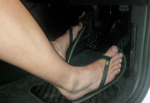 <b>A DANGER BEHIND THE WHEEL:</b> Driving in flip-flops might seems convenient for beach-goers but can put you at risk behind the wheel. <i>Image: SHUTTTERSHOCK</i>