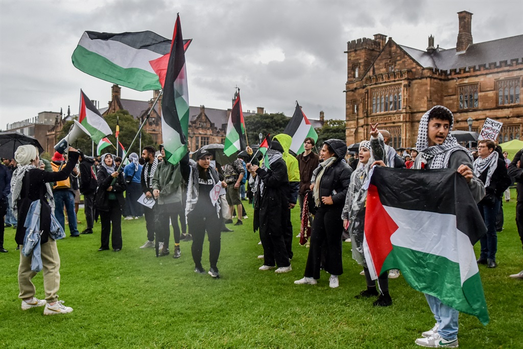 Members of the Australian Palestinian community shout slogans at the Palestinian Protest Campsite at the University of Sydney in Sydney on 3 May 2024. (Ayush Kumar/AFP)