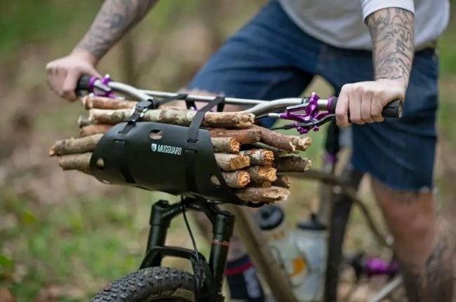 This mountain bike accessory lets you carry braai wood by handlebar
