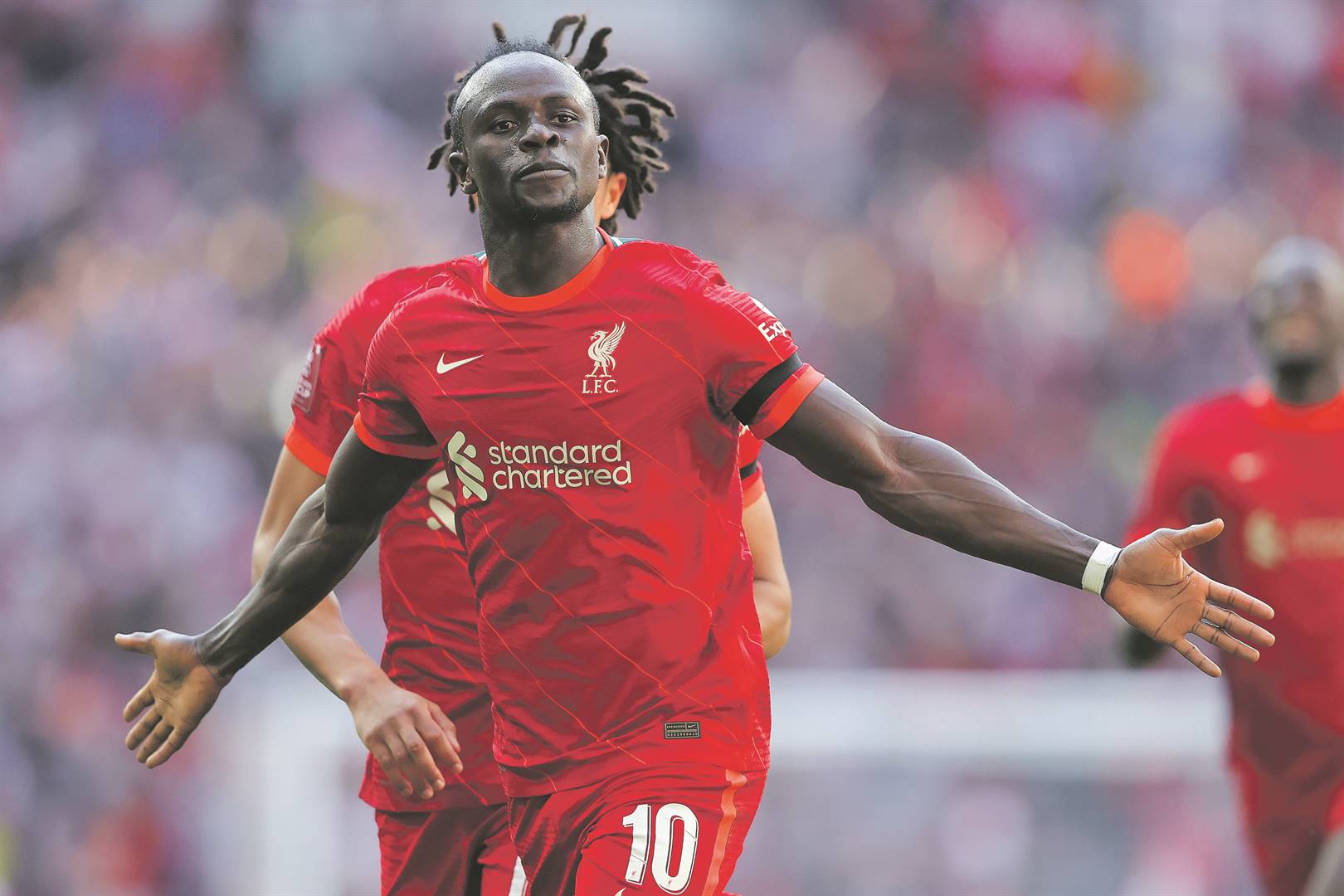 Sadio Mané of Liverpool celebrates after scoring his side's third goal during The Emirates FA Cup semifinal match against Manchester City at Wembley Stadium in the UK yesterday. Photo: James Gill - Danehouse/Getty Images