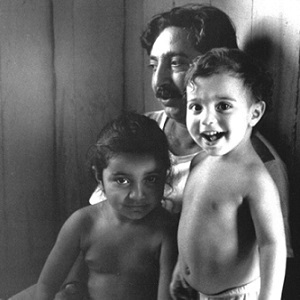 Chico Mendes with his children at home in Xapuri, Brazil, 1988.