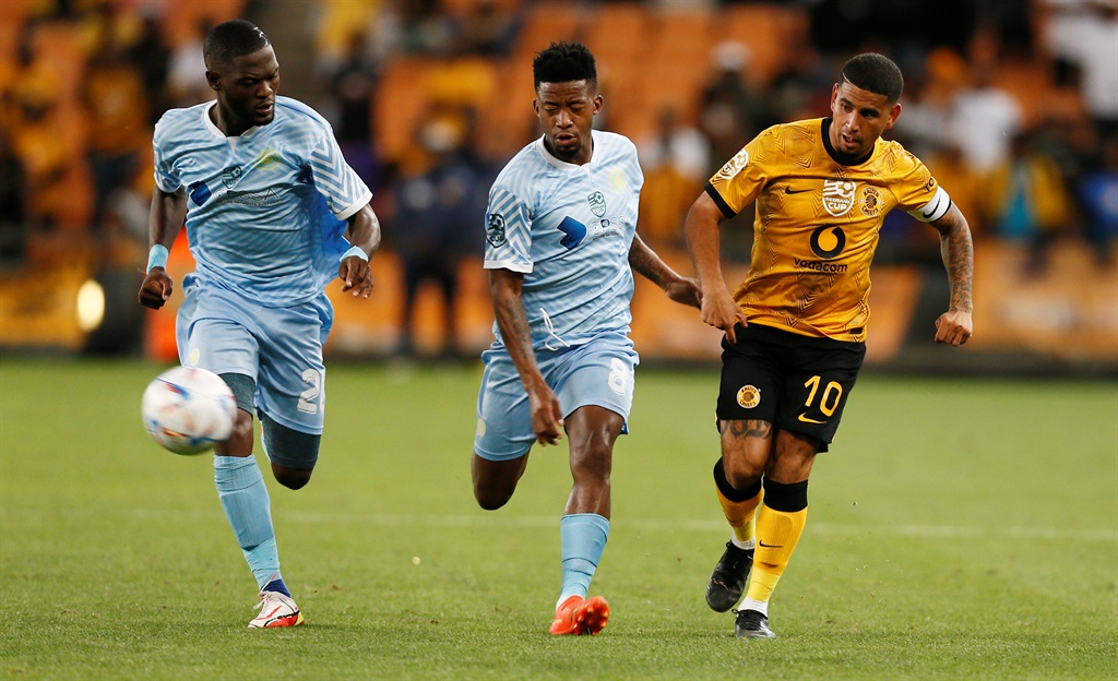 JOHANNESBURG, SOUTH AFRICA - MARCH 12: Keagan Dolly of Kaizer Chiefs in action with Thabang Rakwena and Thabelang Tshoba of Casric Stars during the Nedbank Cup last 16 match between Kaizer Chiefs and Casric Stars at FNB Stadium on March 12, 2023 in Johannesburg, South Africa. (Photo by Gallo Images)