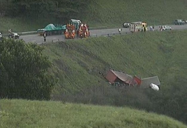 SIGN OF THE TIMES: An articulated truck lies at the bottom of a valley next to the N3 in kwaZulu-Natal. Image: Provincial traffic camera
