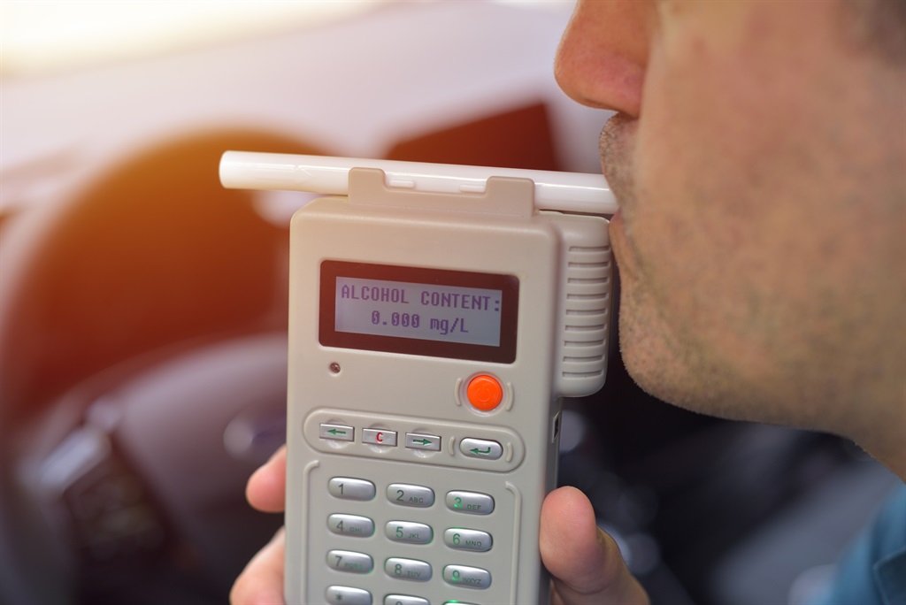 A worker has been rehired after failing a breathalyzer test at work.