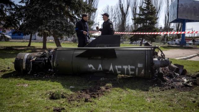 Police inspect the remains of a Russian rocket that killed scores at the Kramatorsk railway station in eastern Ukraine. (Photo by Andrea Carrubba/Anadolu Agency via Getty Images)