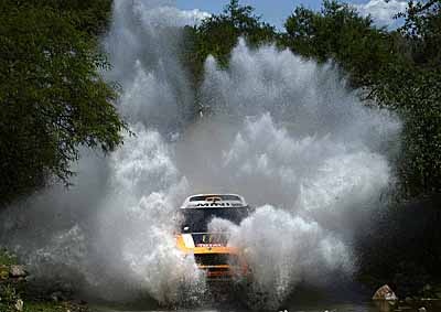 <b>WHERE'S THE BRIDGE:</b> Argentine driver Orlando Terranova and co-driver Paulo Fiuza blast through a river crossing in their Mini during Stage 6 of the 2014 Dakar Rally between Tucuman ad Salta, Argentina, on January 10, 2014. <i>Image: AFP</i>