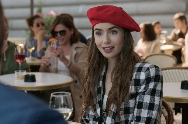 Lily Collins is back as Emily, a young US marketing exec living the high life in Paris. (PHOTO: Gallo Images / Alamy)