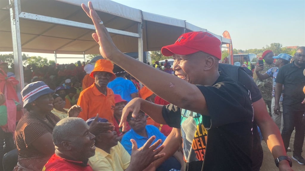 Economic Freedom Fighter (EFF) President and commander-in-chief Julius Malema handshaking residents. Photo by Keletso Mkhwanazi