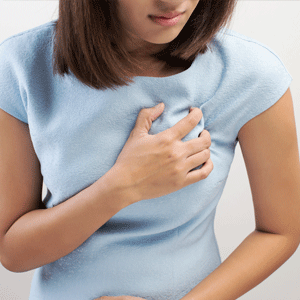 Woman having a heart attack