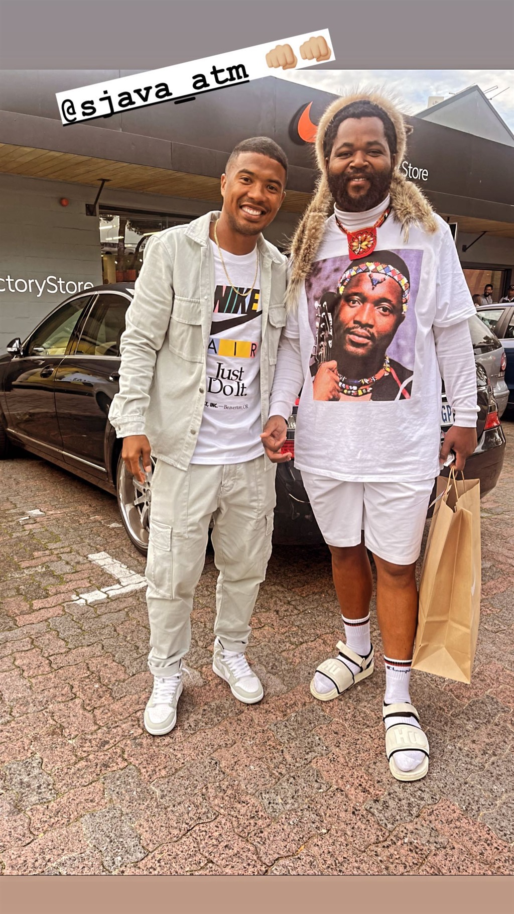 Cape Town City's Lyle Lakay alongside SA rapper Sjava.