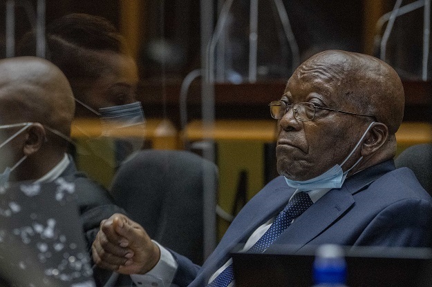 Former South African President Jacob Zuma sits in 