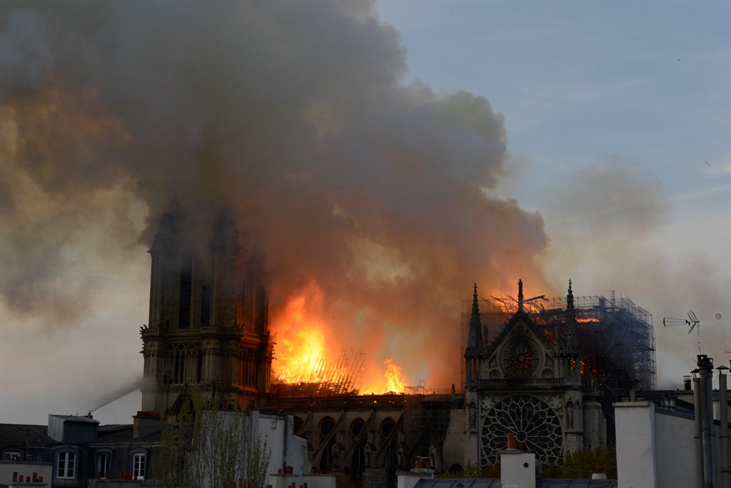 PARIS, FRANCE - APRIL 14: Fire rages through the i