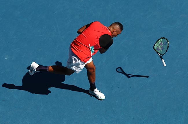 Nick Kyrgios smashes his racquet.(Photo by Clive Brunskill/Getty Images)