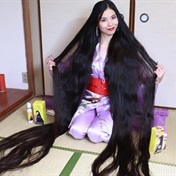 Woman grows her hair to over 2 metres to highlight her heritage in pole dancing routine