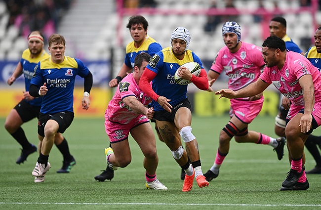 Lions winger Edwill van der Merwe on the charge against Stade Francais. (Photo by Dan Mullan/Getty Images)