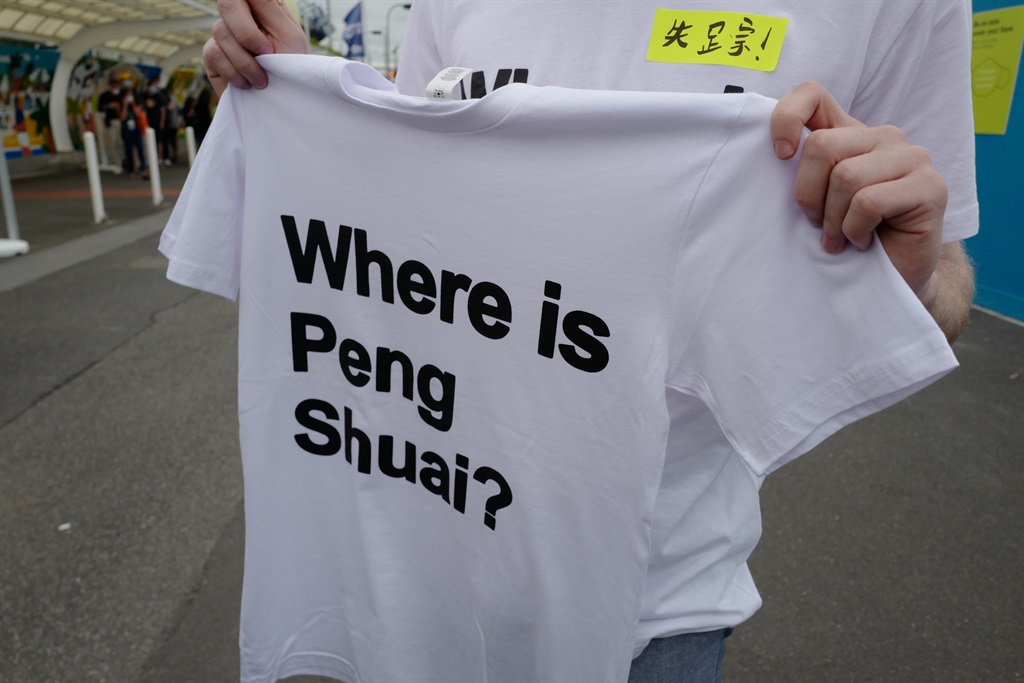 Melbourne based activists hand out Where is Peng Shuai? t-shirts. (Photo by James D. Morgan/Getty Images)