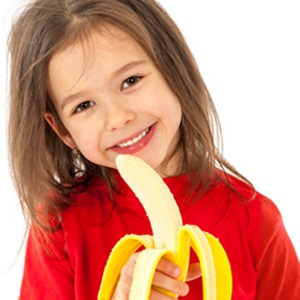 Child eating fruit 