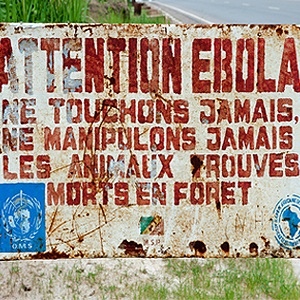 A sign warns visitors that area is a Ebola infected. Copyright: Sergey Uryadnikov