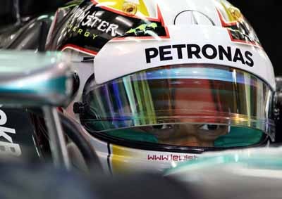 <b>TIME TO CONCENTRATE:</b> Mercedes' Lewis Hamilton sits in his car during second practice session ahead of the 2014 Bahrain GP. He finished fastest from the session, followed by team mate Nico Rosberg. <i>Image: AFP/Patrick Baz</i>