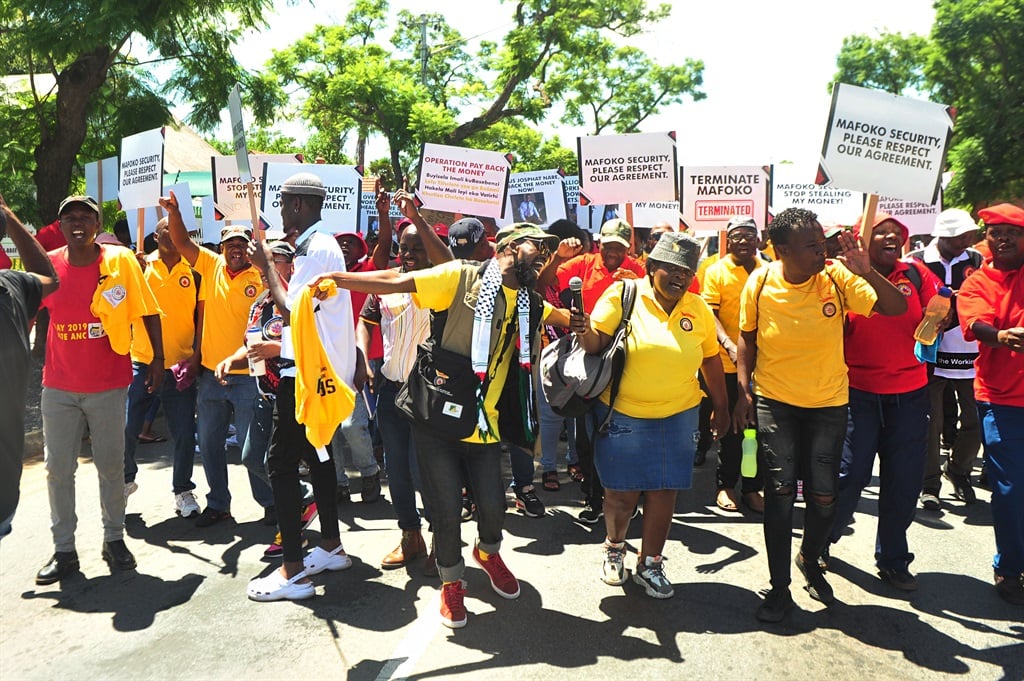 Members of Abanqobi Workers Union, Kungwini Amalgamated Workers Union, the National Union of Metalworkers and the SA Transport and Allied Workers Union picketing outside the Mafoko Security Patrol headquarters in Hatfield, Pretoria.