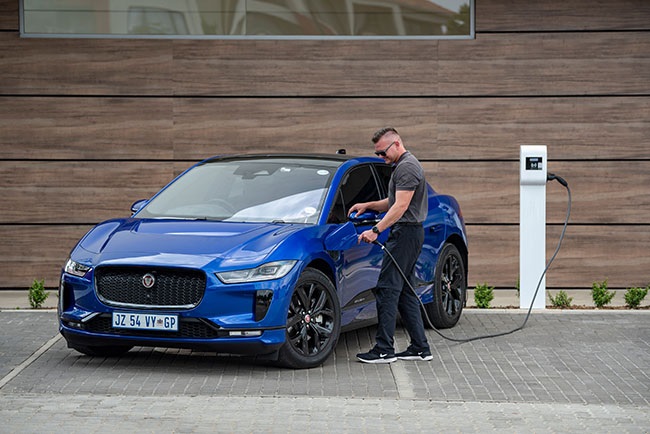 Jaguar South Africa driving instructor Andrew Blane charging the electric I-Pace