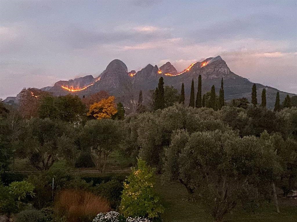 Firefighters continue to battle Lourensford Fire.