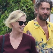 Charlize Theron has found love again with a hunky model after a string of bad romances