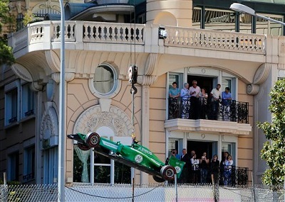 <b>BAD YEAR FOR CATERHAM :</b> Kamui Kobayashi’s Caterham is removed by a crane after he failed to finish the qualifying session ahead of the 2014 Monaco GP. Now it seems the team is set to be sold. <i>Image: AP/Claude Paris</i> 