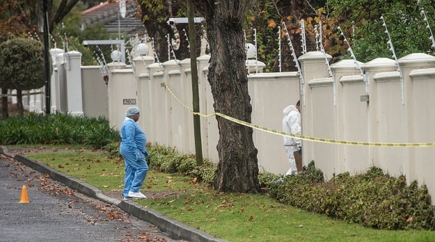 CAPE TOWN, SOUTH AFRICA - MAY 25: Crime scene expe
