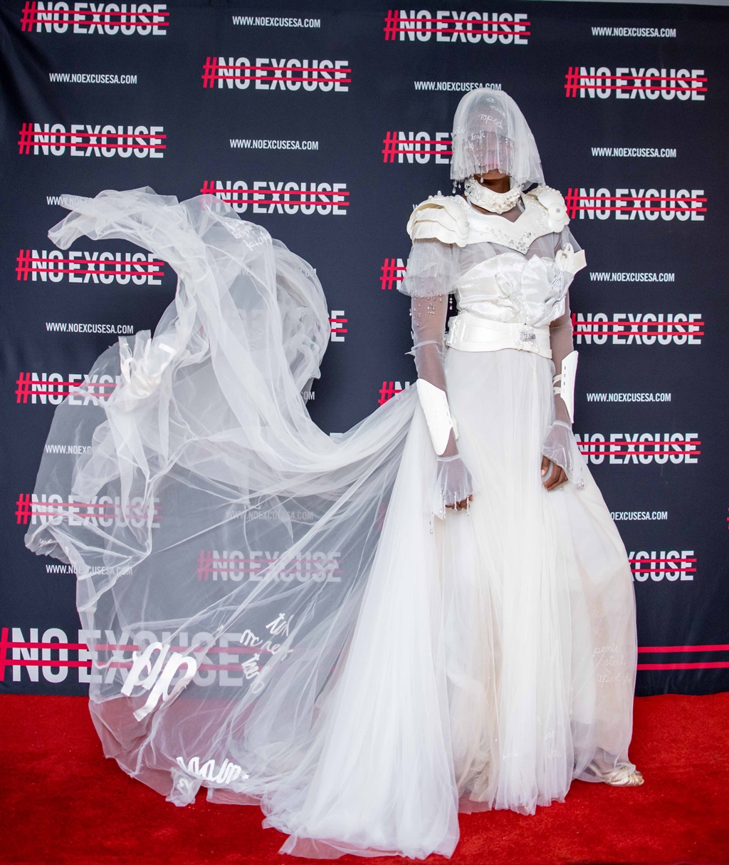 This gown created by designer Suzaan Heyns for Carling Black Label’s #NoExcuse Bride Armour campaign features data from cases of intimate partner violence. (PHOTO: Supplied)