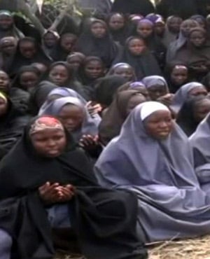 A screengrab taken from a video released by Nigerian Islamist extremist group Boko Haram obtained by AFP shows girls wearing the full-length hijab. (AFP)