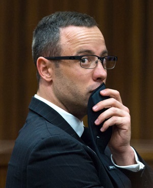 Oscar Pistorius looks on during his murder trial at the North Gauteng High Court in Pretoria. (Daniel Born, AFP)