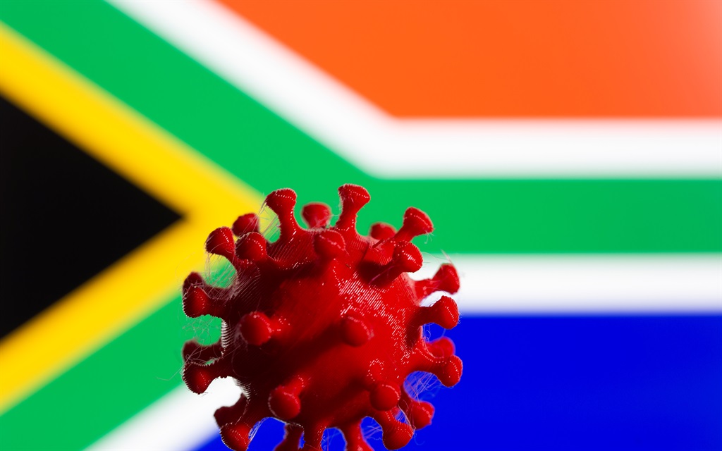3D-printed coronavirus model is seen in front of displayed South Africa flag in this illustration