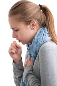 Woman coughing from Shutterstock