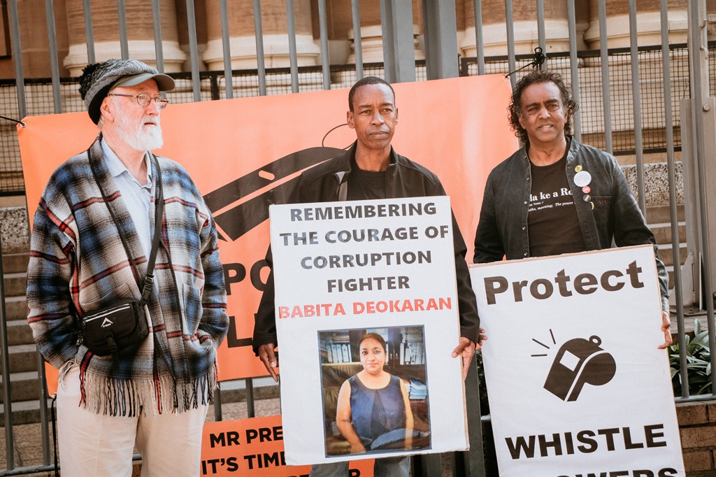 Demonstrators in support of Babita Deokaran outside the South Gauteng High Court in Johannesburg, where six alleged hitmen appeared.