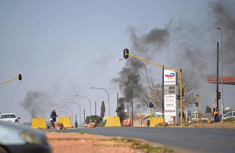 Tembisa residents closed roads and destroyed infrastructure in protest against the lack of feedback from Mayor Tania Campbell regarding service delivery issues.                Photo by Trevor Kunene 
