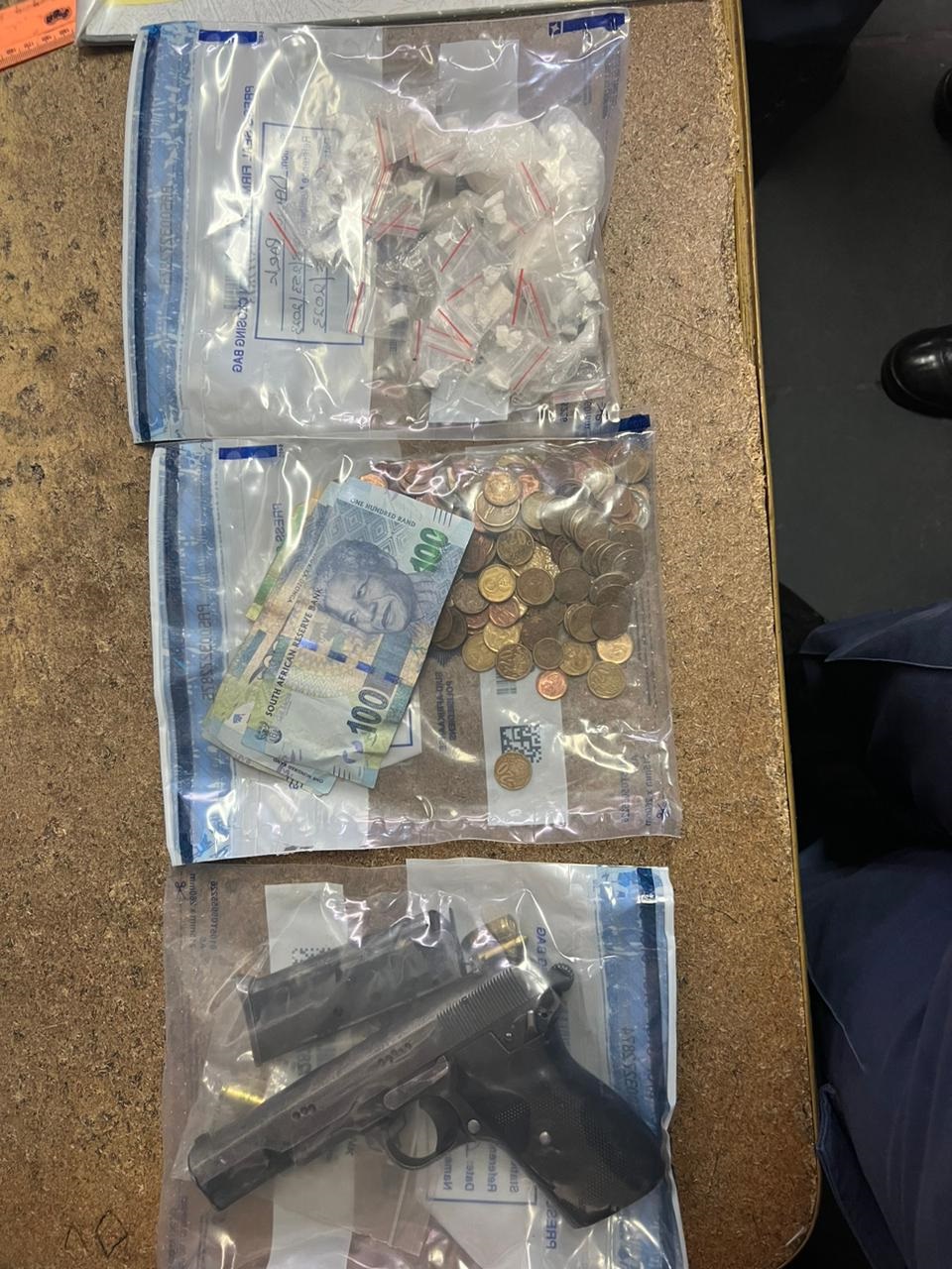 A man arrested for possession of an unlicensed firearm, ammunition and drugs.