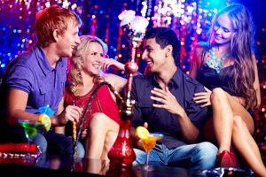 Young adults smoking hookah from Shutterstock