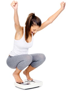 Woman cheering a weight loss goal from Shutterstock