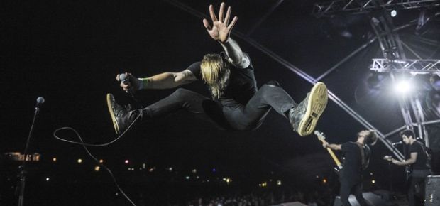 Francois van Coke jumps on stage. (Photo: Sean Brand, Channel24)