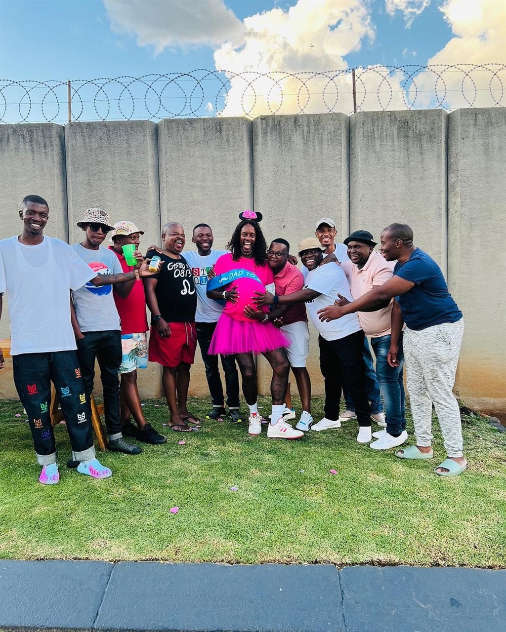 Linda Mntambo at his nappy party with friends and 